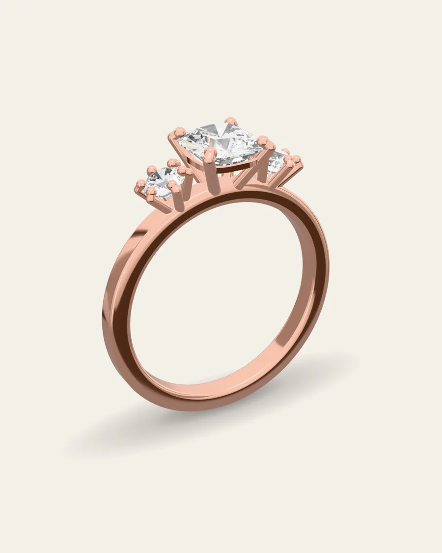 Cushion three-stone · rose gold